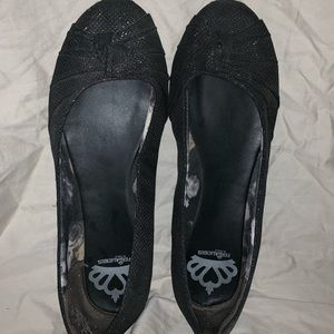 Black sparkly flats by Fergalicious